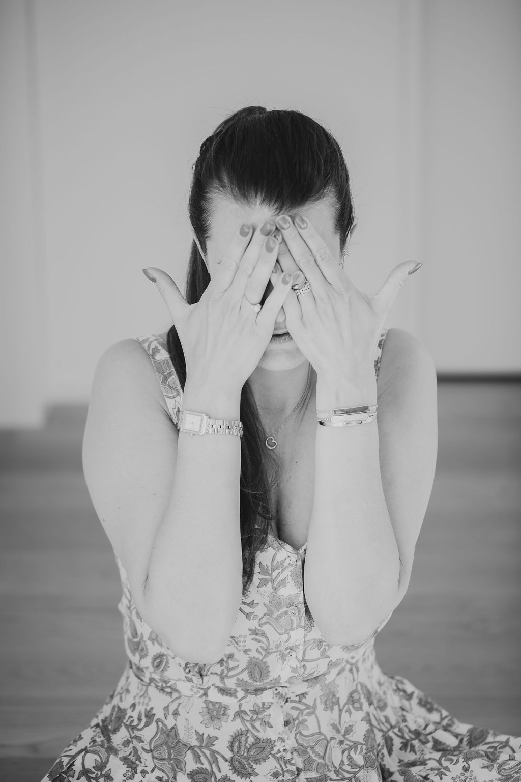 Woman covering her eyes